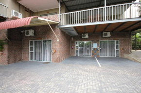 Отель Ingwe Guesthouse  Mbombela